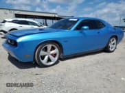 ✅ 2010 Dodge Challenger SRT-8 • VIN: 2B3CJ7DW2AH131799 • Lot: 67161674. Wystawiony na Copart z przebiegiem 92 623 mil. Bezpłatny archiwum sprzedaży aukcyjnych z USA i szczegółowy raport historii pojazdu na DreamBid. Zdjęcie 1.
