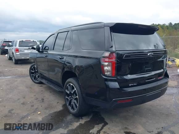 2024 Chevrolet Tahoe RST z VIN 1GNSCRKD0RR302733, wystawiony jako IAAI lot #40800083 z przebiegiem 10 597 mil mil oraz . Historia ofert i sprzedaży dostępna na DreamBid. Obrazek 3.