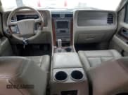 ✅ 2014 Lincoln Navigator • VIN: 5LMJJ3J59EEL01771 • Lot: 50989495. Listed on Copart with 138,516 mi. Free auction sales archive from the USA and detailed vehicle history report at DreamBid. Image 8.