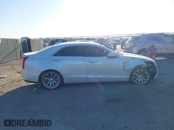 ✅ 2018 Cadillac ATS RWD • VIN: 1G6AA5RX4J0114084 • Лот: 41761517. Опубликован ранее на IAAI с пробегом 104 747 миль. Бесплатный доступ к архиву аукционных продаж из США и подробный отчёт об истории автомобиля на DreamBid. Изображение 13.