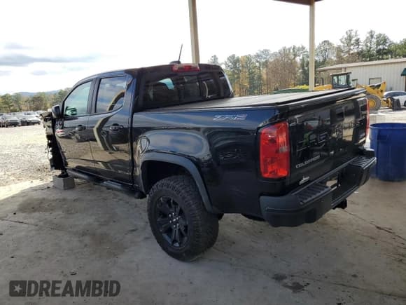 ✅ 2021 Chevrolet Colorado 4WD ZR2 • VIN: 1GCGTEEN4M1298558 • Лот: 91520575. Опубликован ранее на Copart с пробегом 37 502 миль. Бесплатный доступ к архиву аукционных продаж из США и подробный отчёт об истории автомобиля на DreamBid. Изображение 2.