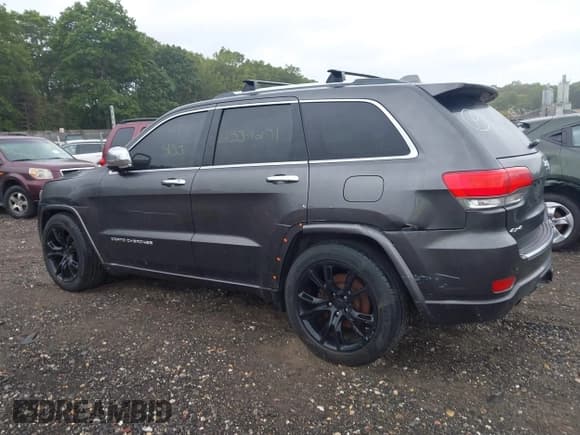 ✅ 2014 Jeep Grand Cherokee Overland • VIN: 1C4RJFCT5EC137468 • Lot: 43254198. Listed on IAAI with Not provided. Free auction sales archive from the USA and detailed vehicle history report at DreamBid. Image 13.