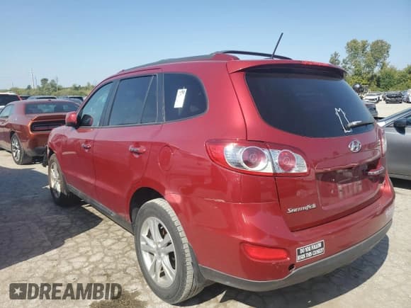 ✅ 2012 Hyundai Santa Fe Limited • VIN: 5XYZK3AB8CG144509 • Lot: 73309644. Listed on Copart with 110,629 mi. Free auction sales archive from the USA and detailed vehicle history report at DreamBid. Image 2.
