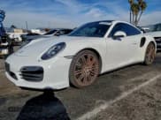 ✅ 2014 Porsche 911 Turbo • VIN: WP0AD2A99ES166661 • Lot: 92766905. Listed on Copart with 38,574 mi. Free auction sales archive from the USA and detailed vehicle history report at DreamBid. Image 1.