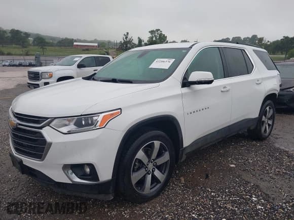✅ 2020 Chevrolet Traverse LT • VIN: 1GNEVHKW0LJ305396 • Lot: 43206376. Listed on IAAI with 60,757 mi. Free auction sales archive from the USA and detailed vehicle history report at DreamBid. Image 18.