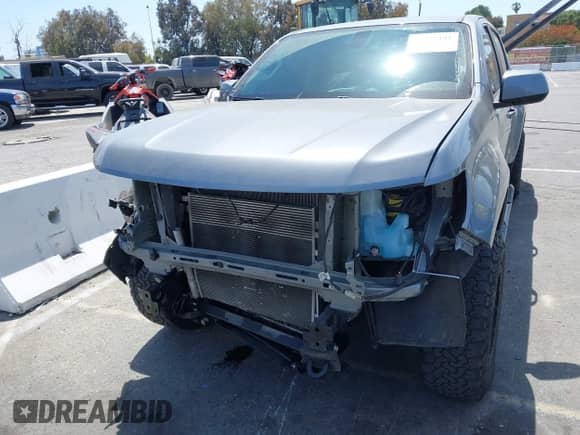 2022 Chevrolet Colorado 4WD Work Truck с VIN 1GCGTBEN2N1148111, выставлен на аукционе IAAI как лот 42327481 с пробегом 56 506 миль миль и . История ставок и продаж доступна на DreamBid. Изображение 6.