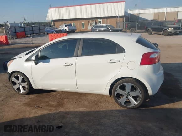 ✅ 2013 Kia Rio EX • VIN: KNADN5A30D6200188 • Lot: 43483118. Listed on IAAI with 171,430 mi. Free auction sales archive from the USA and detailed vehicle history report at DreamBid. Image 14.