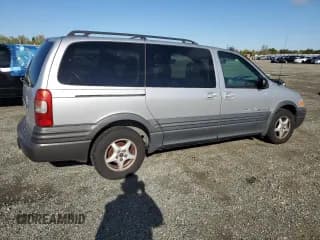 ✅ 2002 Pontiac Montana 1SA • VIN: 1GMDX03E22D169741 • Lot: 51494335. Wystawiony na Copart z przebiegiem 138 740 mil. Bezpłatny archiwum sprzedaży aukcyjnych z USA i szczegółowy raport historii pojazdu na DreamBid. Zdjęcie 3.