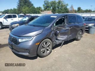 ✅ 2021 Honda Odyssey Touring • VIN: 5FNRL6H85MB013894 • Lot: 71153575. Wystawiony na Copart z przebiegiem 60 452 mil. Bezpłatny archiwum sprzedaży aukcyjnych z USA i szczegółowy raport historii pojazdu na DreamBid. Zdjęcie 1.