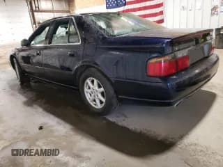 ✅ 1999 Cadillac Seville Touring STS • VIN: 1G6KY5492XU938577 • Lot: 51341705. Listed on Copart with 150,888 mi. Free auction sales archive from the USA and detailed vehicle history report at DreamBid. Image 2.