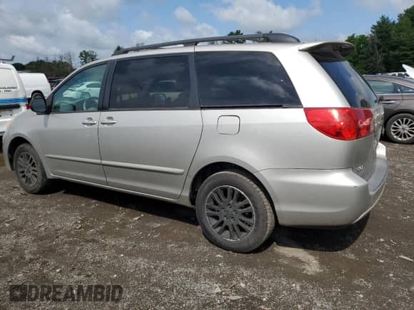 2009 Toyota Sienna LE with VIN 5TDBK23C69S023958, listed as a Copart auction lot 60220025 with 262,409 mi miles and Non repairable. Bid and sale history available at DreamBid. Image 2.