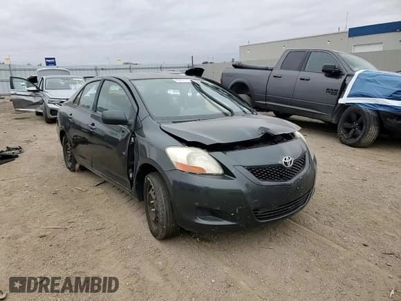 ✅ 2009 Toyota Yaris • VIN: JTDBT903591324423 • Lot: 89731135. Listed on Copart with Not provided. Free auction sales archive from the USA and detailed vehicle history report at DreamBid. Image 13.