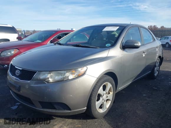 ✅ 2010 Kia Forte EX • VIN: KNAFU4A27A5058436 • Лот: 43772803. Опубликован ранее на IAAI с пробегом 106 469 миль. Бесплатный доступ к архиву аукционных продаж из США и подробный отчёт об истории автомобиля на DreamBid. Изображение 18.