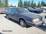 ✅ 1990 Dodge Dynasty • VIN: 1B3XC4639LD800339 • Lot: 42624306. Listed on IAAI with 66,804 mi. Free auction sales archive from the USA and detailed vehicle history report at DreamBid. Image 1.