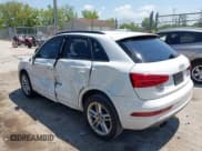 ✅ 2017 Audi Q3 Premium • VIN: WA1BCCFS7HR009192 • Lot: 42734919. Listed on IAAI with 100,100 mi. Free auction sales archive from the USA and detailed vehicle history report at DreamBid. Image 3.