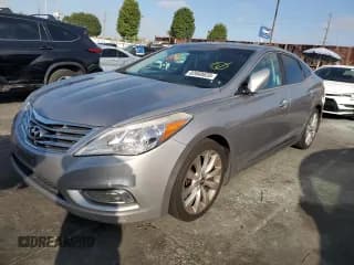 ✅ 2013 Hyundai Azera • VIN: KMHFH4JG9DA213627 • Лот: 82668635. Опубликован ранее на Copart с пробегом 214 578 миль. Бесплатный доступ к архиву аукционных продаж из США и подробный отчёт об истории автомобиля на DreamBid. Изображение 1.