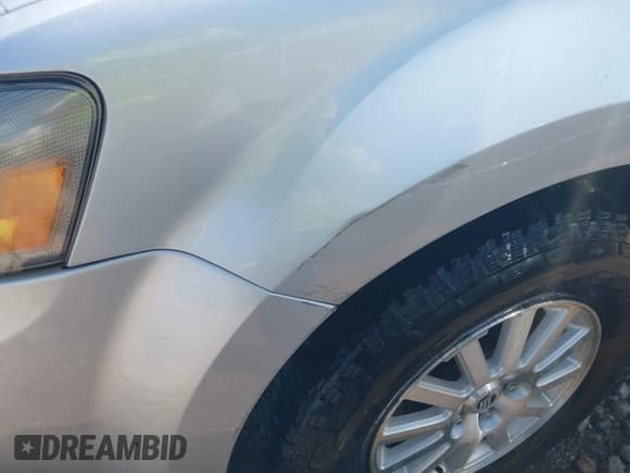 ✅ 2010 Mercury Mariner Premier • VIN: 4M2CN8H72AKJ00244 • Lot: 42502315. Listed on IAAI with 134,214 mi. Free auction sales archive from the USA and detailed vehicle history report at DreamBid. Image 6.