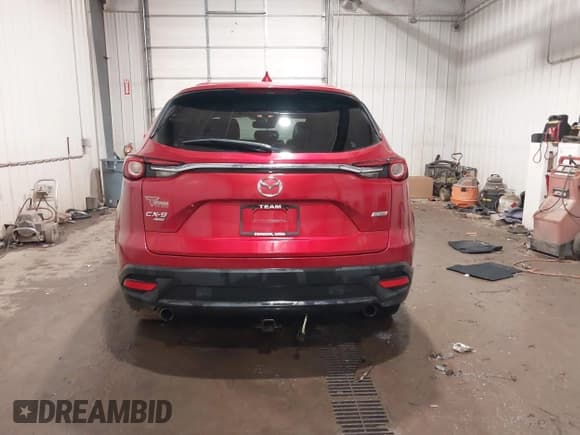 ✅ 2017 Mazda CX-9 Touring • VIN: JM3TCBCY2H0131659 • Lot: 41674239. Listed on IAAI with 168,129 mi. Free auction sales archive from the USA and detailed vehicle history report at DreamBid. Image 16.