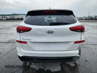 2019 Hyundai Tucson SE z VIN KM8J23A46KU971013, wystawiony jako Copart lot #86607335 z przebiegiem 168 487 mil mil oraz Czysty tytuł • Clean title. Historia ofert i sprzedaży dostępna na DreamBid. Obrazek 6.
