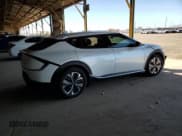 ✅ 2022 Kia EV6 Light • VIN: KNDC34LBXN5078370 • Лот: 80765585. Опубликован ранее на Copart с пробегом 49 108 миль. Бесплатный доступ к архиву аукционных продаж из США и подробный отчёт об истории автомобиля на DreamBid. Изображение 3.