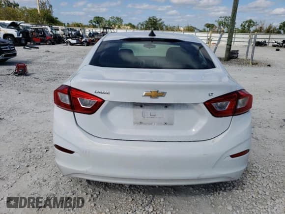 ✅ 2018 Chevrolet Cruze LS • VIN: 1G1BC5SM0J7244939 • Lot: 40384253. Listed on Copart with 41,568 mi. Free auction sales archive from the USA and detailed vehicle history report at DreamBid. Image 6.