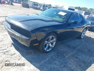 ✅ 2014 Dodge Challenger SXT • VIN: 2C3CDYAG1EH229824 • Lot: 41749410. Wystawiony na IAAI z przebiegiem 103 079 mil. Bezpłatny archiwum sprzedaży aukcyjnych z USA i szczegółowy raport historii pojazdu na DreamBid. Zdjęcie 2.