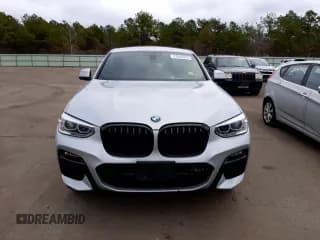 ✅ 2021 BMW X4 xDrive30i • VIN: 5UX2V1C06M9F10870 • Lot: 37548973. Wystawiony na Copart z przebiegiem 13 840 mil. Bezpłatny archiwum sprzedaży aukcyjnych z USA i szczegółowy raport historii pojazdu na DreamBid. Zdjęcie 5.