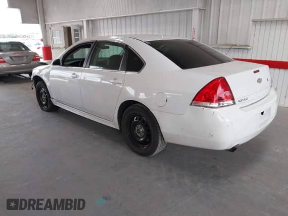 2014 Chevrolet Impala Police Police with VIN 2G1WD5E36E1133932, listed as a IAAI auction lot 42588380 with 174,405 mi miles and . Bid and sale history available at DreamBid. Image 3.