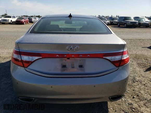 2012 Hyundai Azera with VIN KMHFH4JG7CA124394, listed as a Copart auction lot 81489605 with 61,823 mi miles and Salvage title. Bid and sale history available at DreamBid. Image 6.