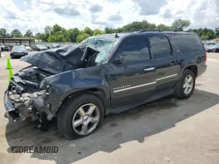 ✅ 2011 Chevrolet Suburban LTZ • VIN: 1GNSKKE3XBR232628 • Lot: 59883425. Listed on Copart with 198,403 mi. Free auction sales archive from the USA and detailed vehicle history report at DreamBid. Image 1.