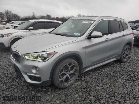 ✅ 2018 BMW X1 xDrive28i • VIN: WBXHT3C3XJ3H32854 • Lot: 91694855. Listed on Copart with 69,683 mi. Free auction sales archive from the USA and detailed vehicle history report at DreamBid. Image 1.