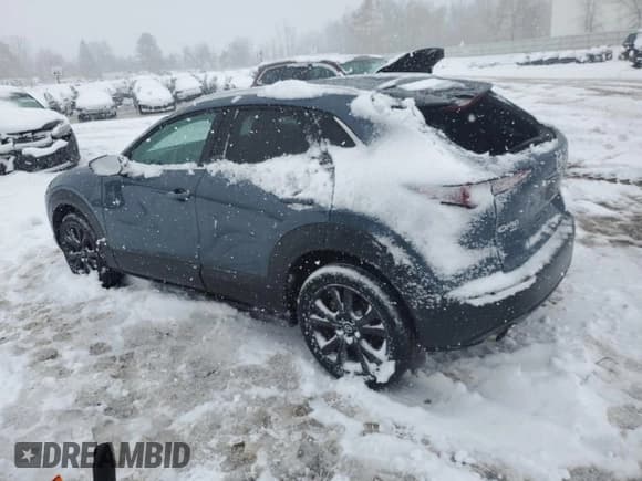 ✅ 2022 Mazda CX-30 2.5 Turbo • VIN: 3MVDMBAY9NM442834 • Lot: 91933855. Listed on Copart with 49,386 mi. Free auction sales archive from the USA and detailed vehicle history report at DreamBid. Image 2.