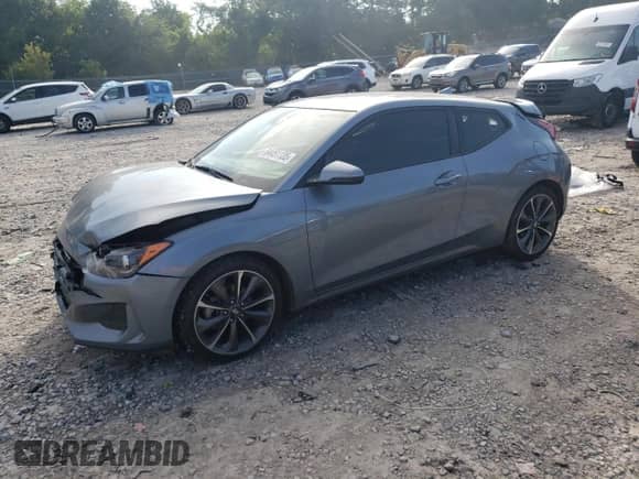 2020 Hyundai Veloster Premium z VIN KMHTG6AF6LU030370, wystawiony jako Copart lot #64451135 z przebiegiem 49 443 mil mil oraz Szkoda całkowita • Salvage title. Historia ofert i sprzedaży dostępna na DreamBid. Obrazek 1.