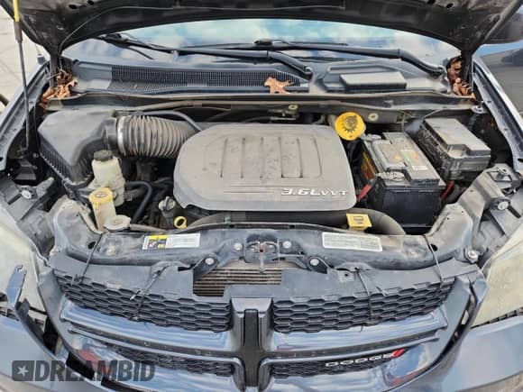 2014 Dodge Grand Caravan R/T with VIN 2C4RDGEG5ER472931, listed as a Copart auction lot 82223975 with 197,678 mi miles and Salvage title. Bid and sale history available at DreamBid. Image 12.