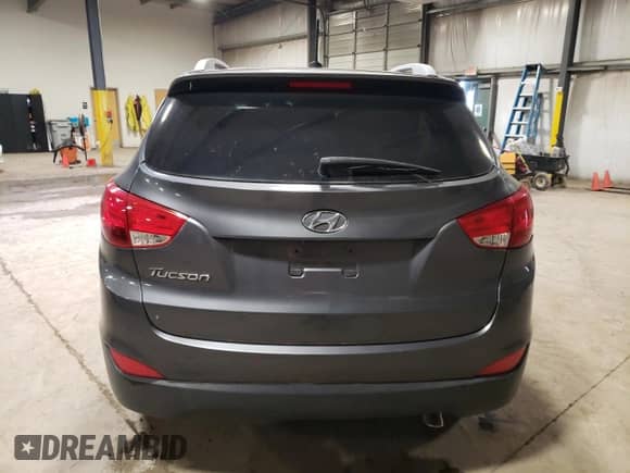 2015 Hyundai Tucson SE z VIN KM8JU3AG1FU973407, wystawiony jako Copart lot #59017604 z przebiegiem Nie podano mil oraz Szkoda całkowita • Salvage title. Historia ofert i sprzedaży dostępna na DreamBid. Obrazek 6.