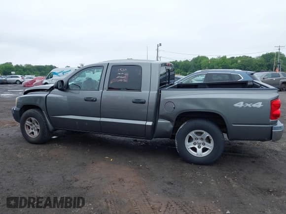 ✅ 2005 Dodge Dakota SLT • VIN: 1D7HW48N55S338679 • Lot: 42525904. Listed on IAAI with 107,988 mi. Free auction sales archive from the USA and detailed vehicle history report at DreamBid. Image 14.