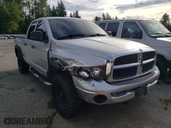 2005 Dodge 1500 SLT z VIN 1D7HU18N85S303218, wystawiony jako Copart lot #68878684 z przebiegiem 244 007 mil mil oraz Szkoda całkowita • Salvage title. Historia ofert i sprzedaży dostępna na DreamBid. Obrazek 4.