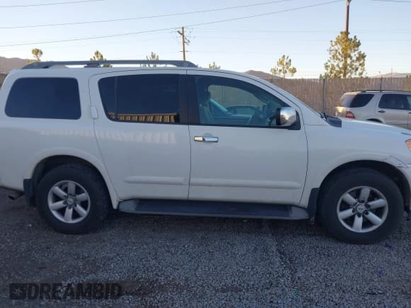 ✅ 2012 Nissan Armada Platinum • VIN: 5N1BA0NC5CN605983 • Lot: 43850123. Listed on IAAI with 142,828 mi. Free auction sales archive from the USA and detailed vehicle history report at DreamBid. Image 13.