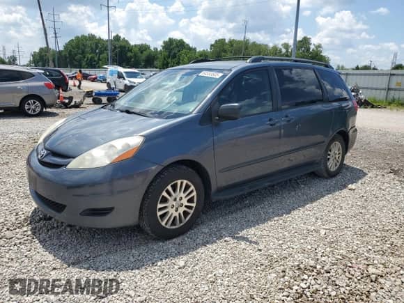 2009 Toyota Sienna LE with VIN 5TDBK23C59S026009, listed as a Copart auction lot 64553505 with 187,214 mi miles and Salvage title. Bid and sale history available at DreamBid. Image 1.