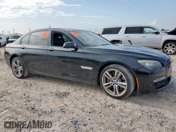 ✅ 2011 BMW 7 Series 750Li • VIN: WBAKB8C5XBCY64741 • Лот: 63798285. Опубликован ранее на Copart с пробегом 100 850 миль. Бесплатный доступ к архиву аукционных продаж из США и подробный отчёт об истории автомобиля на DreamBid. Изображение 4.