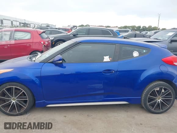 ✅ 2013 Hyundai Veloster Turbo • VIN: KMHTC6AE9DU181238 • Lot: 43525329. Listed on IAAI with 121,343 mi. Free auction sales archive from the USA and detailed vehicle history report at DreamBid. Image 14.