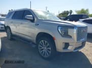 ✅ 2021 GMC Yukon Denali • VIN: 1GKS1DKL6MR191045 • Lot: 41776812. Listed on IAAI with 70,084 mi. Free auction sales archive from the USA and detailed vehicle history report at DreamBid. Image 1.