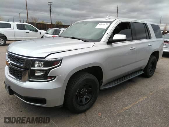 2016 Chevrolet Tahoe Commercial with VIN 1GNSKDEC5GR368328, listed as a IAAI auction lot 41975629 with 104,205 mi miles and . Bid and sale history available at DreamBid. Image 14.