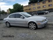 ✅ 2005 Jaguar X-Type 3.0L • VIN: SAJWA51A25WE60281 • Lot: 82056655. Listed on Copart with Not provided. Free auction sales archive from the USA and detailed vehicle history report at DreamBid. Image 4.