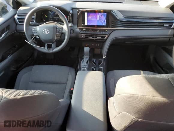 2025 Toyota Camry LE with VIN 4T1DAACK8SU067003, listed as a Copart auction lot 84061975 with 9,394 mi miles and Salvage title. Bid and sale history available at DreamBid. Image 8.