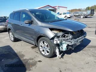 ✅ 2014 Ford Escape Titanium • VIN: 1FMCU0J92EUE55006 • Lot: 43559574. Wystawiony na IAAI z przebiegiem 98 269 mil. Bezpłatny archiwum sprzedaży aukcyjnych z USA i szczegółowy raport historii pojazdu na DreamBid. Zdjęcie 1.