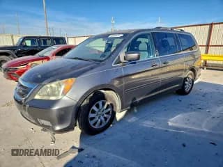 ✅ 2010 Honda Odyssey EX-L • VIN: 5FNRL3H68AB034103 • Лот: 95981635. Опубликован ранее на Copart с пробегом 126 963 миль. Бесплатный доступ к архиву аукционных продаж из США и подробный отчёт об истории автомобиля на DreamBid. Изображение 1.