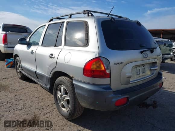 2004 Hyundai Santa Fe GLS z VIN KM8SC13EX4U799955, wystawiony jako IAAI lot #41240442 z przebiegiem 281 394 mil mil oraz . Historia ofert i sprzedaży dostępna na DreamBid. Obrazek 3.