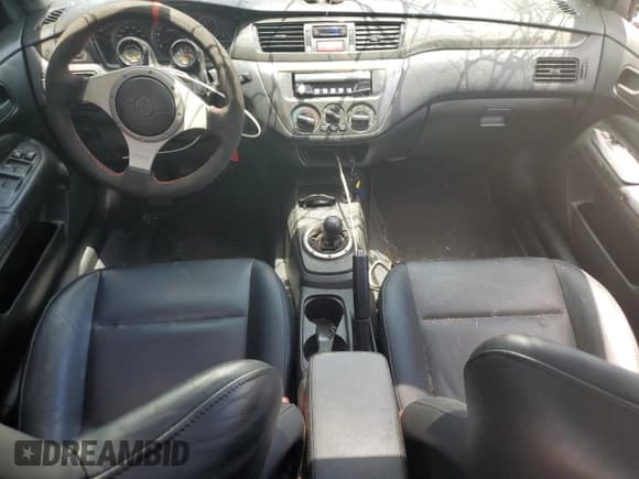 ✅ 2005 Mitsubishi Lancer Evolution VIII • VIN: JA3AH86D35U026855 • Lot: 63498425. Wystawiony na Copart z przebiegiem 66 764 mil. Bezpłatny archiwum sprzedaży aukcyjnych z USA i szczegółowy raport historii pojazdu na DreamBid. Zdjęcie 8.