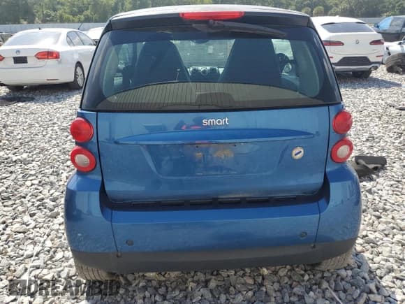 ✅ 2009 Smart fortwo Pure • VIN: WMEEJ31X69K312553 • Лот: 57811135. Опубликован ранее на Copart с пробегом 156 487 миль. Бесплатный доступ к архиву аукционных продаж из США и подробный отчёт об истории автомобиля на DreamBid. Изображение 6.